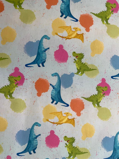 Tricoline 100% Algodón - Infantil Dinosaurios fondo Celeste (50 x 150)