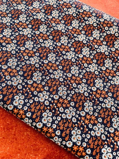 Tricoline 100% Algodón - TT112 Tinto Florecitas naranja fondo azul marino (50 x 1509